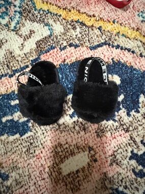 Black Faux Fur Baby Slippers with Branded Elastic Heel Strap